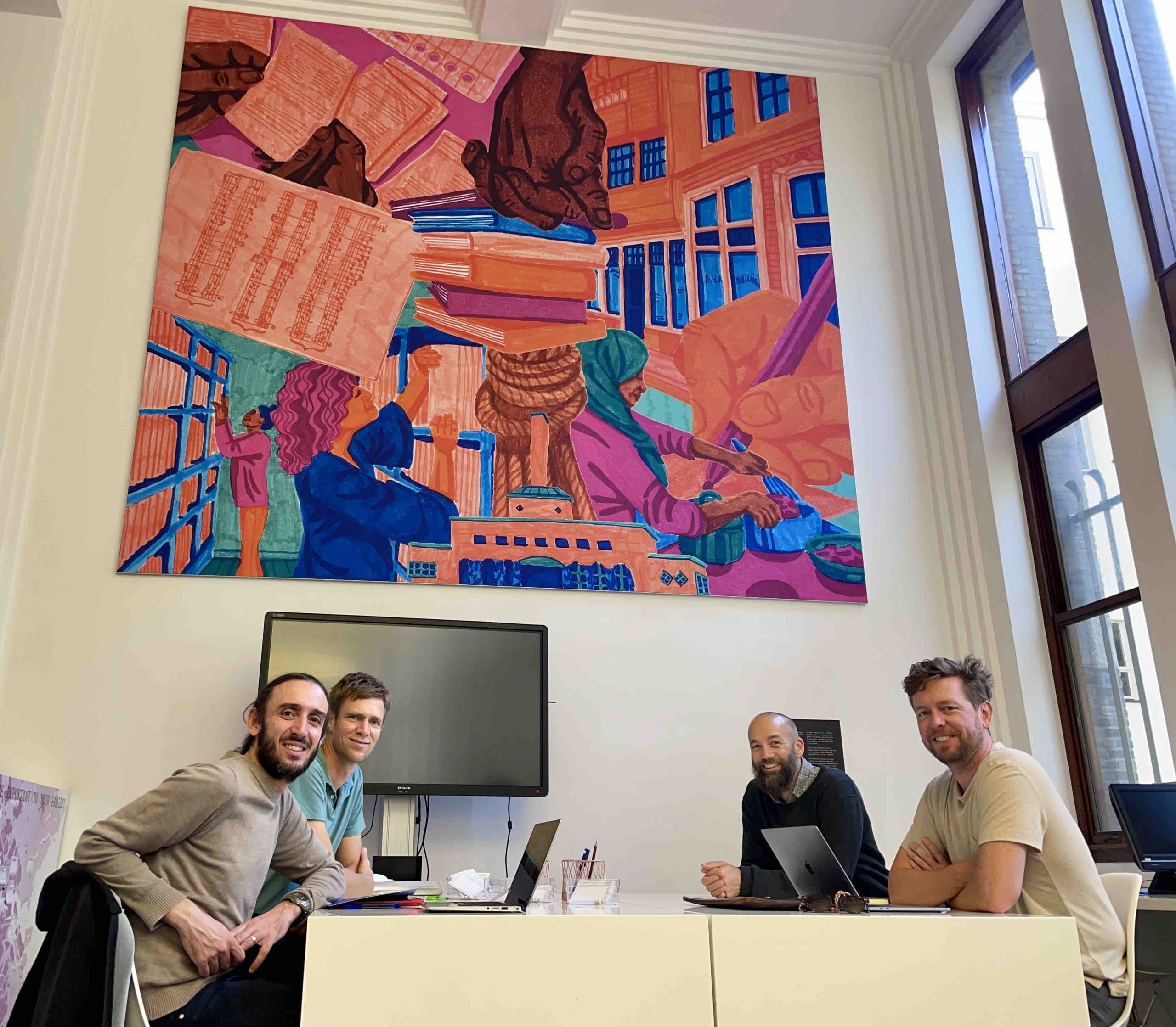 The Terra Potentia project team (from left) Jonas Hein, Ashley Carse, Henrik Ernstson, and Joshua Lewis, at the Stadsarchief Amsterdam, 2022. Photo by Henrik Ernstson, 2022.