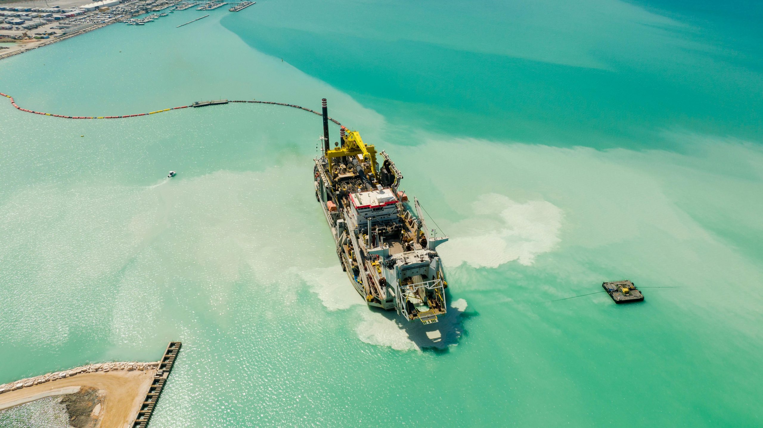 Dredge boat at work. Photo by Kelly, 2022. Free to use from www.pexels.com.